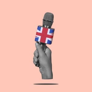 man with a mic patterned with the union jack