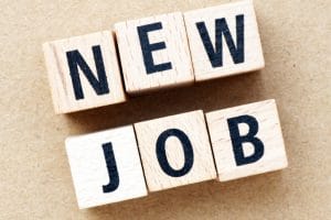 new job words composed of wooden letters. a concept for business.