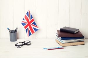 great britain flag and books on the student table.