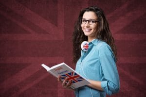 beautiful student girl posing with notebooks